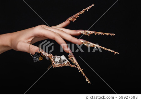 Creative design of nails on female hands. Art manicure. 59927598