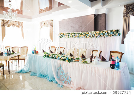 Interior of a restaurant prepared for wedding ceremony Interior of a restaurant prepared for wedding ceremony 59927734