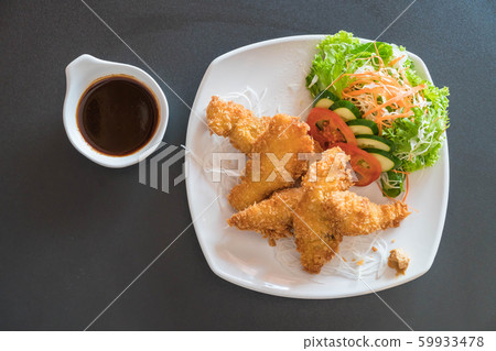 fried fish with tonkatsu sauce fried fish with tonkatsu sauce 59933478