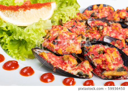 Baked mussels in half shell with filling and side Baked mussels in half shell with filling and side 59936450