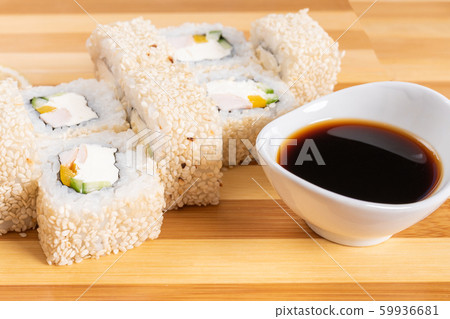 Sushi, rolls in white sesame, with cheese, avocado 59936681