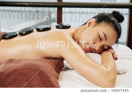 Woman relaxing in spa salon Woman relaxing in spa salon 59937345