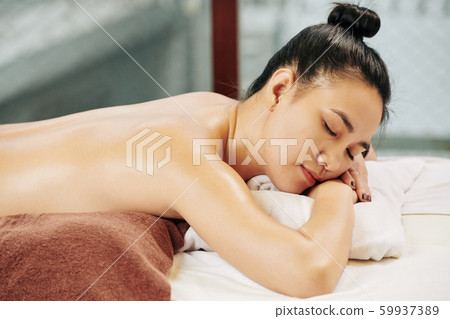 Woman sleeping in spa salon 59937389