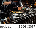 chef cooking noodles in the restaurant 59938367
