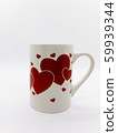 White mug with red heart  isolated on white 59939344