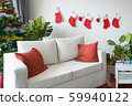 Empty living room is decorated with Christmas tree 59940122