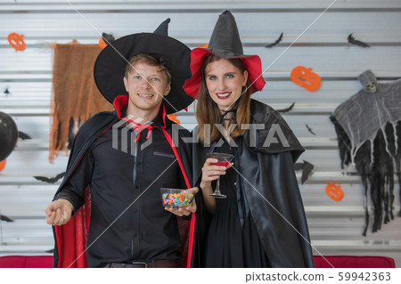 Caucasian lover enjoying in Halloween party.. Caucasian lover enjoying in Halloween party.. 59942363