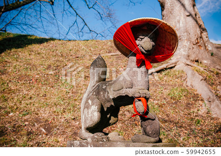 Kitsune Japanese Fox stone statue with red scarft Kitsune Japanese Fox stone statue with red scarft 59942655