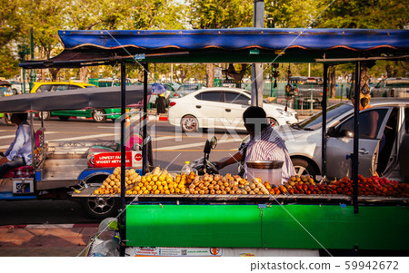 Bangkok street food vender with grill and fry sausage snack stall vender Bangkok street food vender with grill and fry sausage snack stall vender 59942672