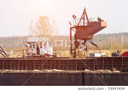 Extraction of construction river sand using a special vessel dredger, industrial, system Extraction of construction river sand using a special vessel dredger, industrial, system 59943494