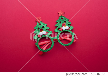 Funny eyeglasses in the form of Christmas tree Funny eyeglasses in the form of Christmas tree 59946135