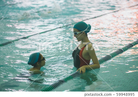 Kids swimming Kids swimming 59948995