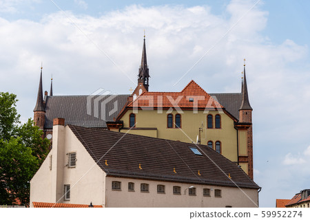 Old houses and St. George church in historic centre of Wismar, Germany 59952274