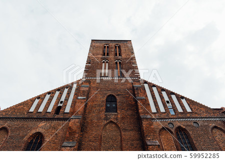 Low angle view of the facade of the church of Saint Nicholas in Wismar, Gemany 59952285