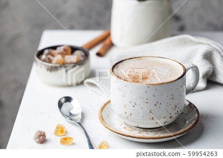 cup of cappuccino with cinnamon 59954263