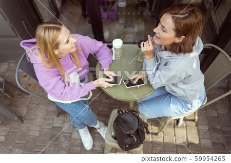 Top view picture of cute girls that being in cafe 59954265