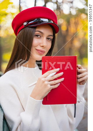 Portrait of pretty female that posing on camera Portrait of pretty female that posing on camera 59955347