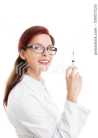 Beautiful smiling female doctor with a syringe 59955520