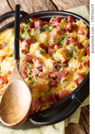 American strata breakfast with ham, onions, cheese 59956029