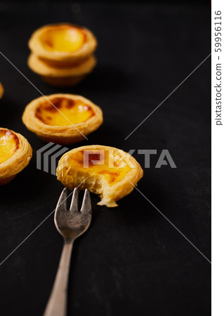 Egg tart dessert on the table. Egg tart dessert on the table. 59956116