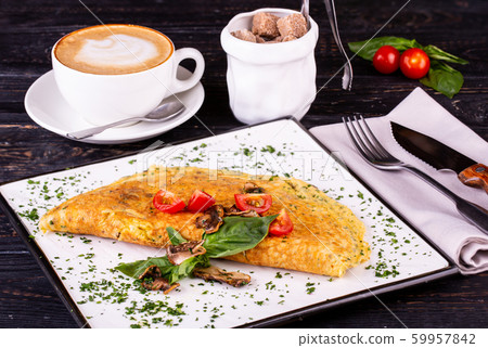Omelet with mushrooms and greens 59957842