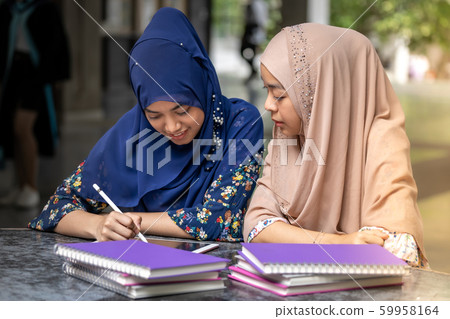 Muslim Student reading book Muslim Student reading book 59958164