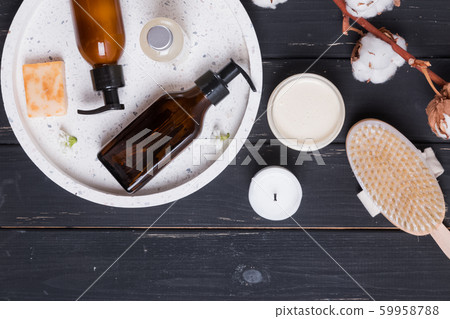 Organic natural herbal cosmetics on black wooden background. 59958788
