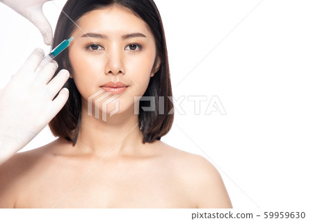 Asain young woman gets injection of botox in her Asain young woman gets injection of botox in her 59959630