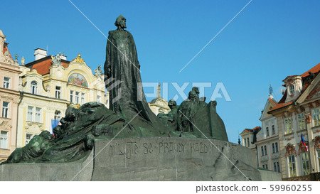 Jan Hus Memorial Old Town Square stands In Prague, statue of bronze stone depicts victorious Hussite warriors heroes or protestants, Historic, Artistic Art Nouveau architecture landmark, built 1915 Jan Hus Memorial Old Town Square stands In Prague, statue of bronze stone depicts victorious Hussite warriors heroes or protestants, Historic, Artistic Art Nouveau architecture landmark, built 1915 59960255
