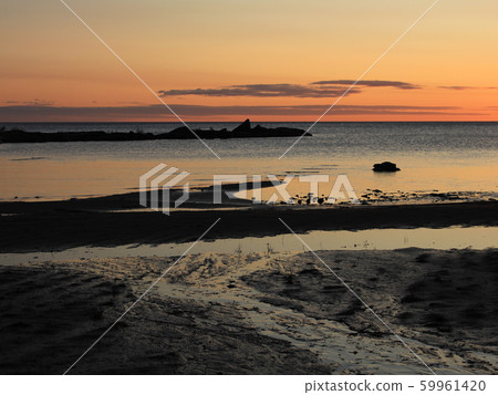 Sand beach and rock formation in Vita Sannar. 59961420