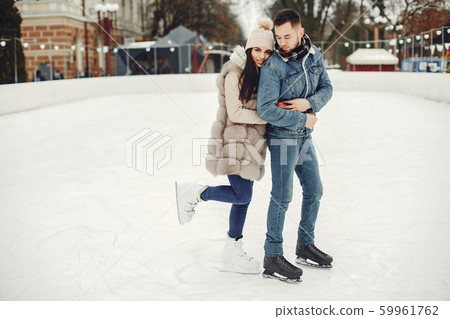 Cute couple in a ice arena 59961762