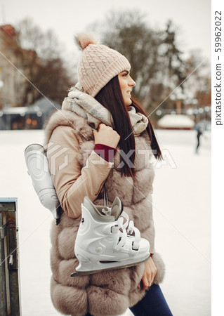 Cute and beautiful girl in a winter city Cute and beautiful girl in a winter city 59962022