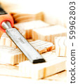 pieces of wood with chisel on the boards background 59962803