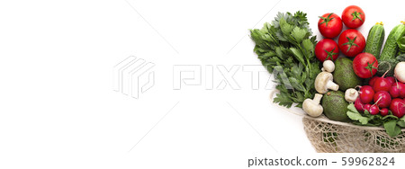 Bunch of mix organic vegetables inside zero waste shopping bag 59962824