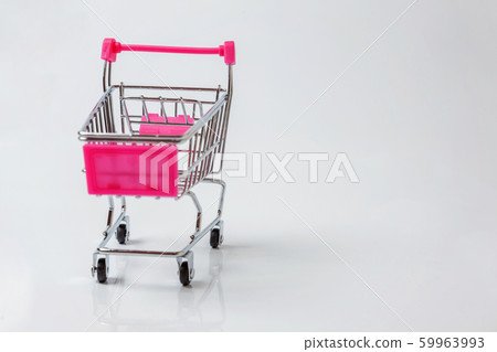 Small supermarket grocery toy push cart on white Small supermarket grocery toy push cart on white 59963993
