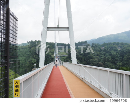 Kokonoe bridge at Kuju “dream” large suspension bridge Kokonoe bridge at Kuju “dream” large suspension bridge 59964708