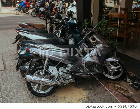 Motorbike, scooter, traditional two wheels transport in Asia Motorbike, scooter, traditional two wheels transport in Asia 59967690