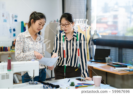 designer coworkers creatives discussing magazine designer coworkers creatives discussing magazine 59967696