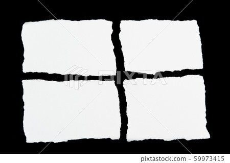 tear white paper pieces of paper on black 59973415