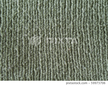 Olive green wool hand knitted texture abstract background 59973706