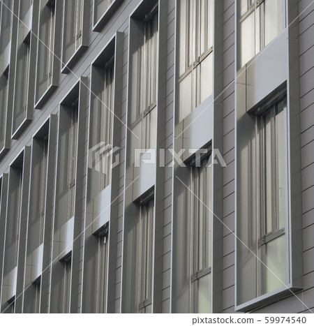 silver gray windows of modern building architectonic detail background silver gray windows of modern building architectonic detail background 59974540