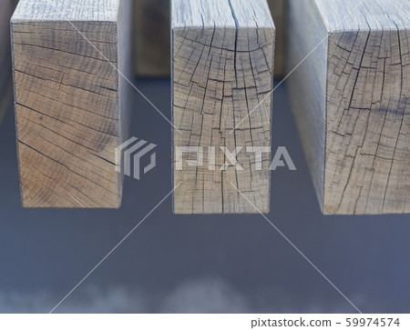 close up natural wooden board on gray soft background close up natural wooden board on gray soft background 59974574