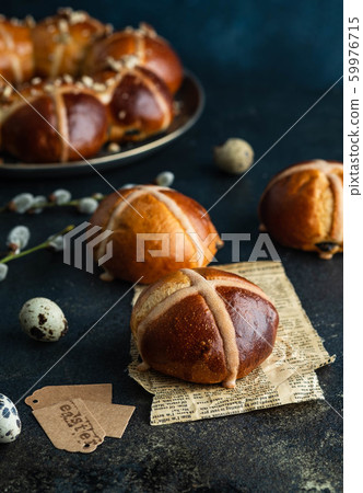 Traditional Easter cross buns on easter background. Traditional Easter cross buns on easter background. 59976715