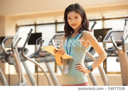 Female fitness trainer Female fitness trainer 59977389