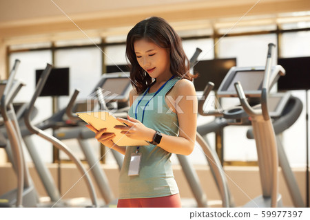 Female fitness trainer Female fitness trainer 59977397