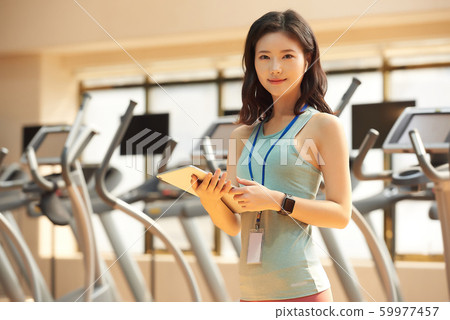 Female fitness trainer Female fitness trainer 59977457