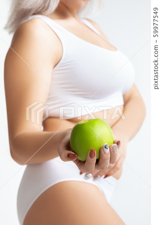 Beautiful female body, concept of bodycare and lifting Beautiful female body, concept of bodycare and lifting 59977549