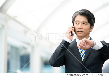 Businessman smartphone phone 59977832