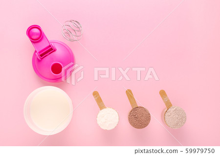 different flavors of protein with a shaker and fresh milk, copy space 59979750