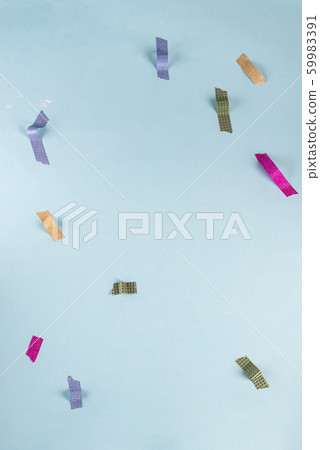 Set of colored tape slices isolated on blue background. Insulating tape of different shapes and colors. Set of colored tape slices isolated on blue background. Insulating tape of different shapes and colors. 59983391